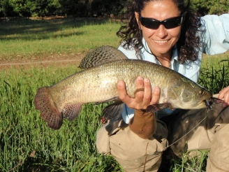 Carolina and a nice Tararira caught right on the shore Carolina and a nice Tararira caught right on the shore